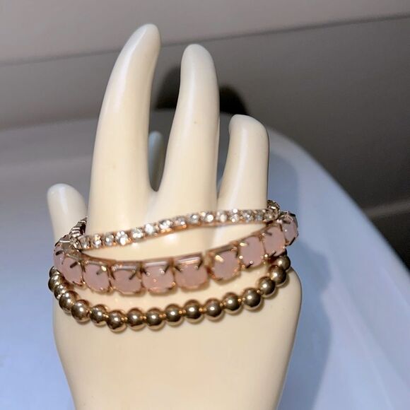 Three separate gold tone stretch bracelets - Gold bead, pink stone & rhinestone - Picture 1 of 3